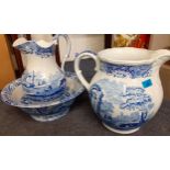 A Spode blue and white washbowl and jug in the Italian pattern and another, larger Spode jug,