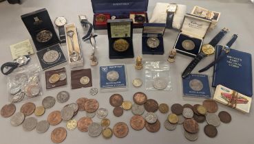 A mixed lot to include British and foreign coinage, commemorative Isle of Man coinage, and others,