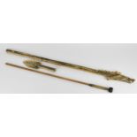 A carved bone tribal blowpipe with dragon design, 125 cm long, together with a bamboo and wood