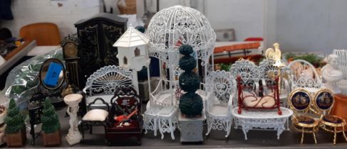 A quantity of wirework dolls house furniture, mainly garden and conservatory items, together with