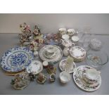 A mixed lot to include a Delft plate with certificate, porcelain figure groups to include Dresdon,