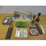 A mixed lot to include a green Carvacraft phenolic amber Bakelite desk blotter, printing and