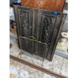 A pair of Victorian cast iron panels together with a fire guard and screen Location: