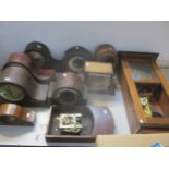 A quantity of early 20th century mahogany and oak cased wall clocks and mantel clocks to include