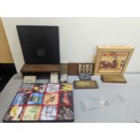 A mixed lot to include playing cards, cribbage boards, Monopoly, and a boxed set of Asahi beer