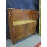 An Art Nouveau oak wall hanging two door cabinet, 56cm h x 54cm w Location: