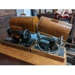 Two oak cased Singer sewing machines, serial numbers EE045870 and Y6943331 Location:
