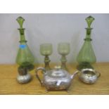 Two 19th century Dutch style glass decanters and stoppers decorated with raspberry prunts, two green