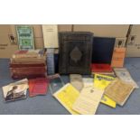 A mixed lot of books to include a Family Bible, road books, maps and manuals Location: