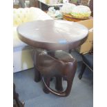 A teak carved elephant table, 83cm h x 62cm w Location: