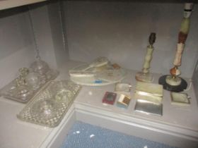 A mixed lot to include dressing table sets, cigarette lighters, and onyx table lights and a