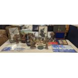 A mixed lot to include mixed metalware, cased fish knives and forks, tankards and others, along with