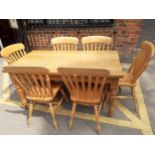 A light oak Stewart Linford dining table, together with six matching dining chairs Location: RTAF