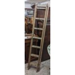 Two vintage wooden ladders Location:
