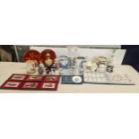 A mixed lot to include commemorative mugs and shaving cups, decanter and centrepiece, golf related