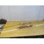 Two archery bows, a Treen Kat and a Les Howis Bows Ltd bow Location: