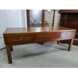 A late 20th century military style coffee table in yew with brass details 47cm h x 122cm w