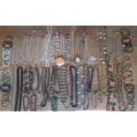 A large quantity of late 20th Century to modern day bead necklaces to include a double strand of