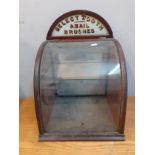 A vintage Select tooth & nail brushes mahogany cabinet with domed glass front and internal glass