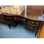 An early 20th century mahogany serpentine fronted sideboard/serving table, 84cm h x 123cm w,