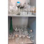 Domestic glassware to include pedestal wine glasses and mixed decanters together with three table