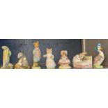 A collection of seven Beswick Beatrix Potter models to include Jemima Puddleduck, Peter in bed, Foxy