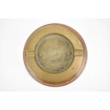 An early 20th century ashtray, made from brass and teak taken from the R.M.S Mauretania 1907-1935,