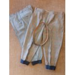 Two pairs of Spencers woollen checked golfing trousers, three quarter length with elasticated cuffs,