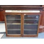 A late 19th/early 20th century Patent Medicines Chemist display cabinet in mahogany with painted