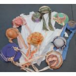 Ten decorative theatrical bonnets in the Edwardian style, adorned with colourful ribbons, silk