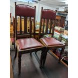 A set of eight Art Nouveau mahogany and leather upholstered dining chairs Location: