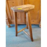 A rustic French three legged stool, 48cm h Location: SR