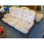 A retro Ercol three seater Jubilee sofa, two matching armchairs and footstools Location: