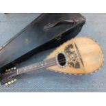 A Neapolitan F-Tito Matini mandolin in case. Location:BWR