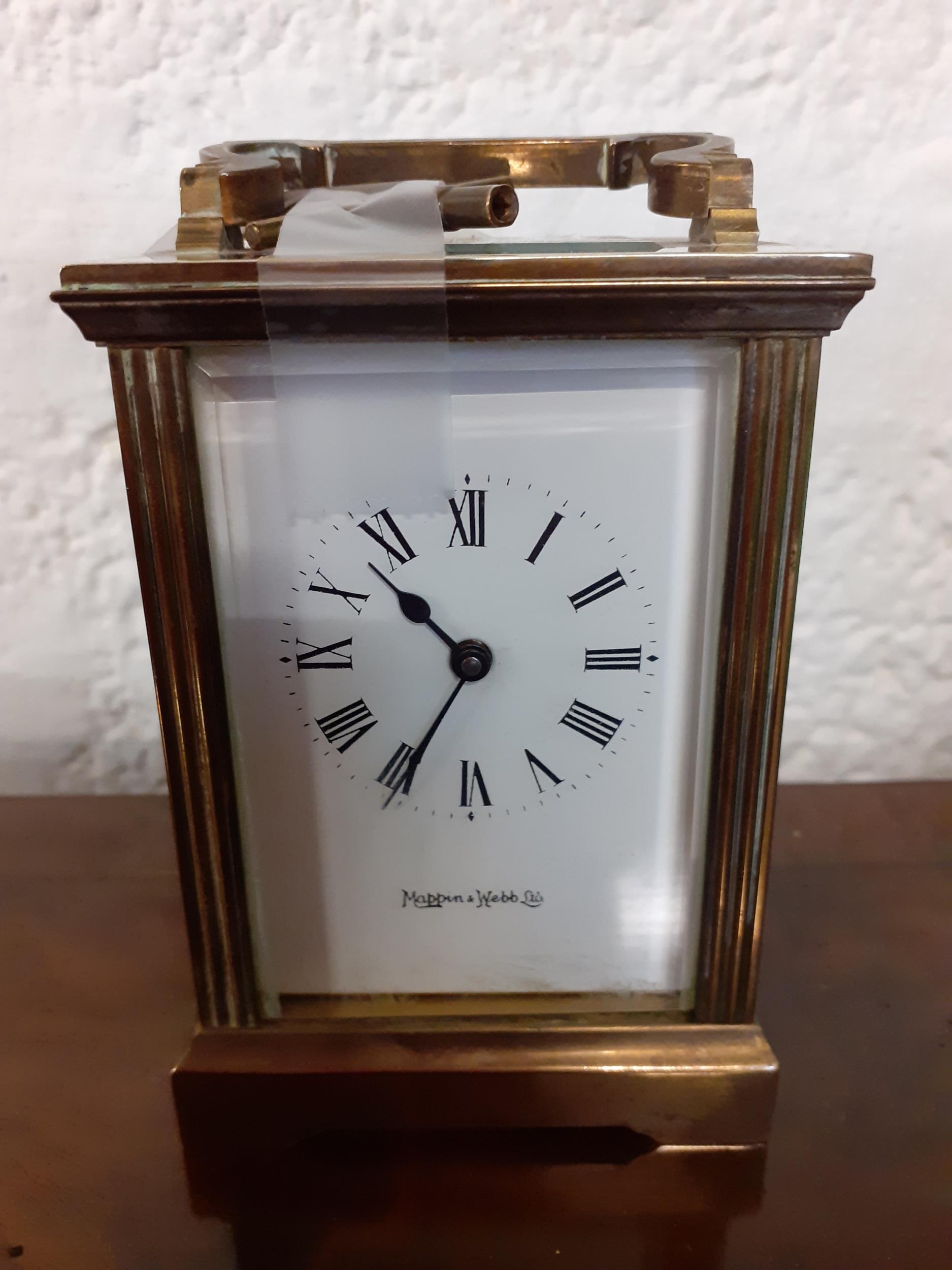 A Mappin & Webb brass cased five window carriage clock with key Location: RAB