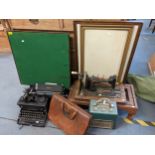 A mixed lot to include a typewriter, sewing machine, accountants bag, card table, engraving, frame