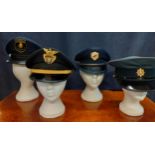 Four Worldwide police hats comprising a Mexican Policia Fiscal Federal Agente cap, size 56, an