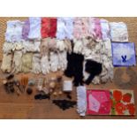 A quantity of 20th century ladies gloves to include kid gloves together with sewing implements,