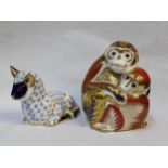 Two Royal Crown Derby paperweights to include one in the form of monkeys and the other a sheep,