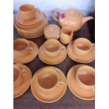 A German orange glazed tea set, 7 setting Location: BWR