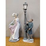 Lladro, two figures, a lamp lighter, 48cm high and a lady numbered 5283, 35cm high Location: