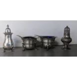 A pair of early 20th century silver condiments together with two early 20th century pepper pots,