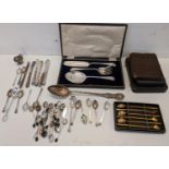 A mixed lot of silver and silver plate to include a selection of silver coffee bean spoons and