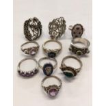 A group of 10 silver and silver coloured dress rings to include one with a blue Wedgwood
