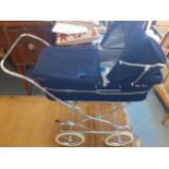 A 1980s Silver Cross pram with a blue cord fabric Condition: Good, no stains or fading Location: