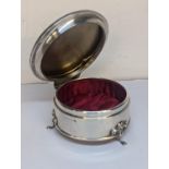 An early 20th century silver ring box on feet Location: