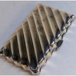 A late Victorian silver cigarette case with a fluted body and engraved initials A.F.L, 55.3g