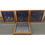 A group of four display cases containing Police related enamel pin badges to include various UK