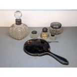 Silver collared glass dressing table items to include silver lidded jars, decanter and a