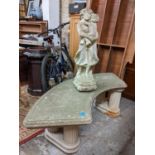 A cast stone curved bench with pillar columns, and a weathered figure statue Location: